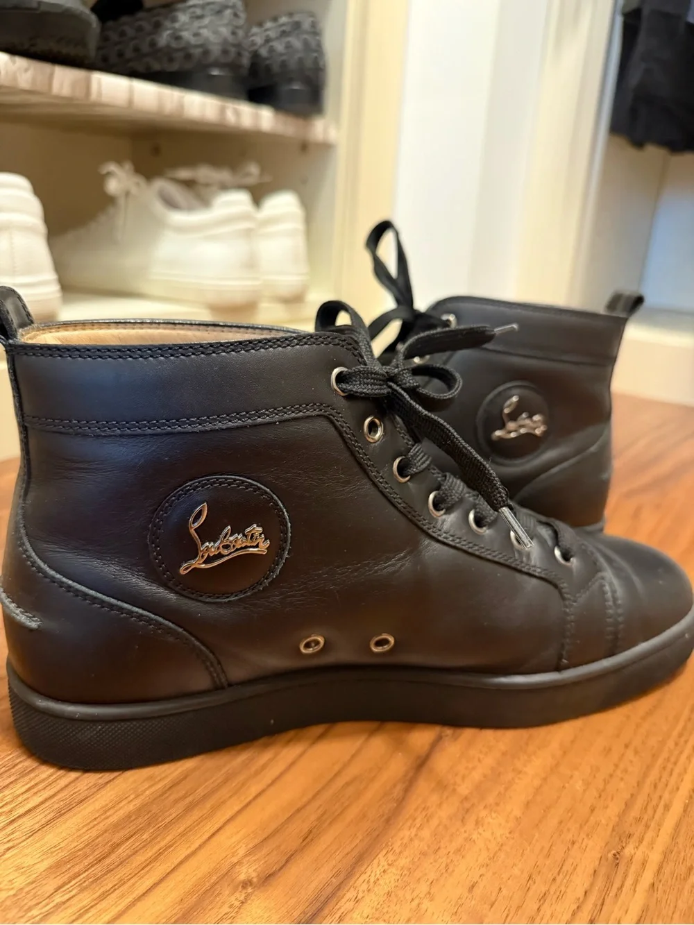 CHRISTIAN LOUBOUTIN Black High Top Calf Leather Sneakers
